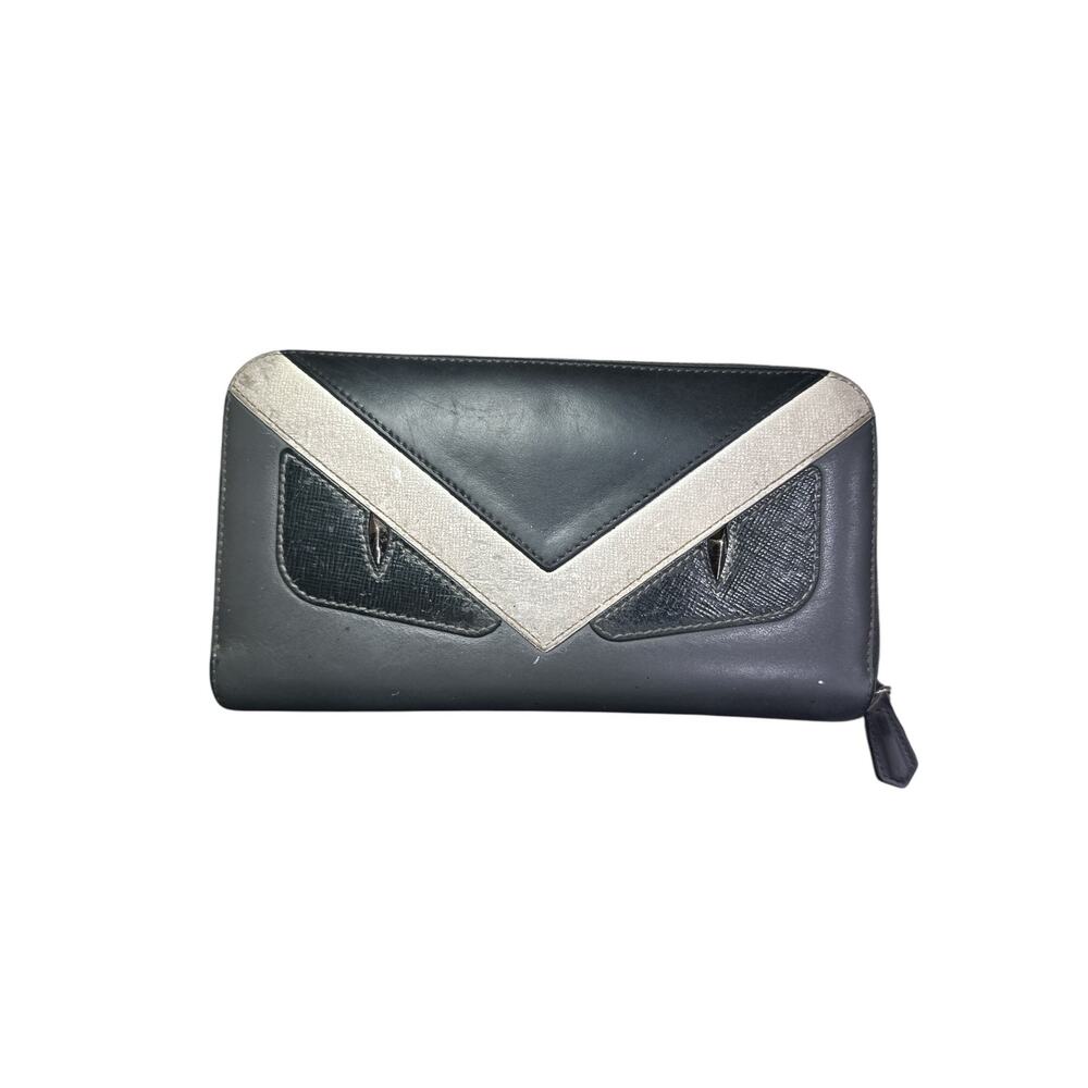 195. Authentic Pre-Owned Fendi Monster Zip Around Wallet – Black & Ivory